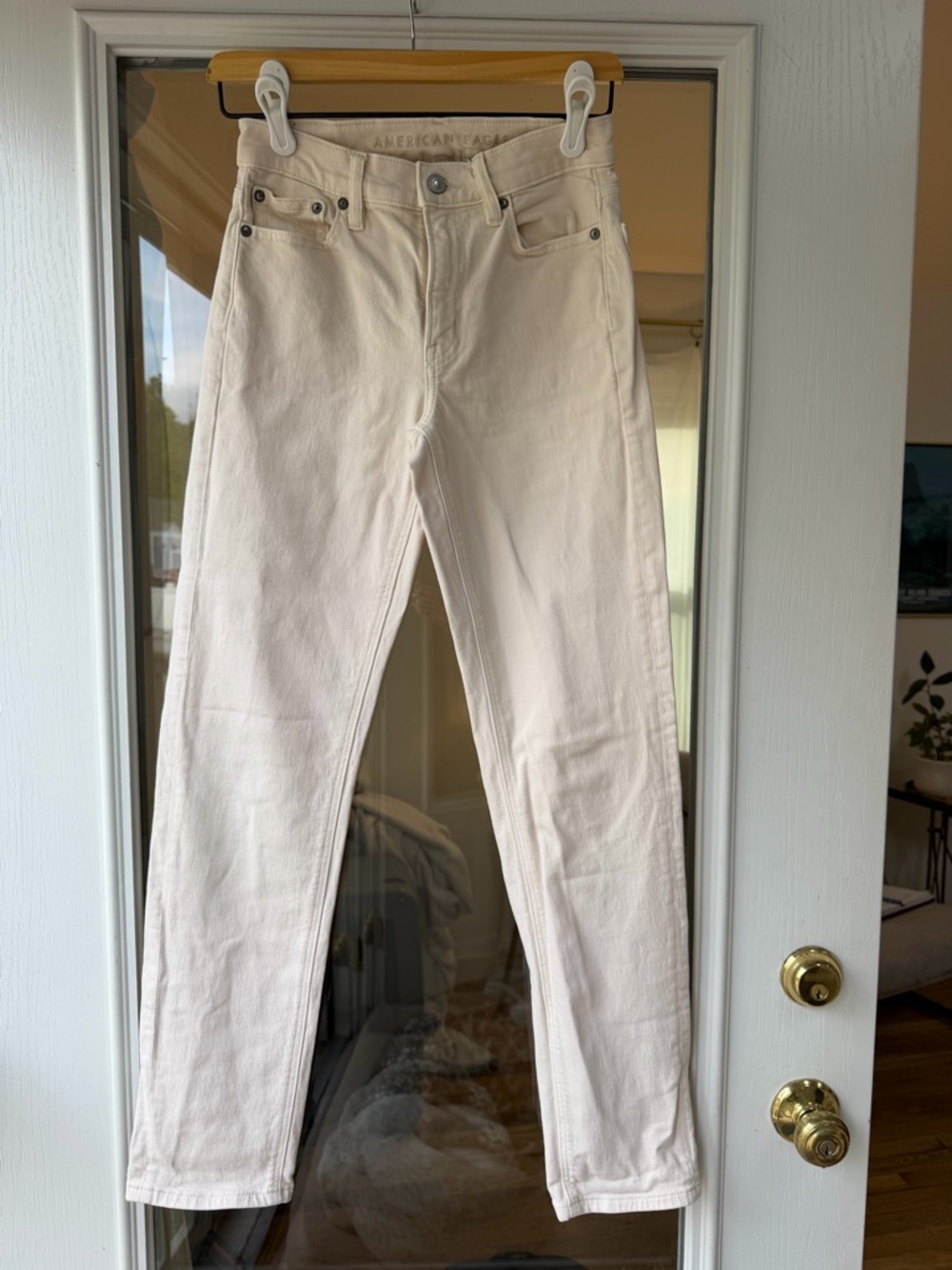 American Eagle Outfitters Super High-Rise Straight Jeans in Cream